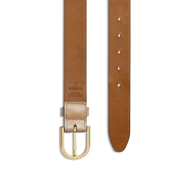 Smooth, lightweight and stylish, our 1 ¼-inch-wide Belt is handcrafted from premium smooth leather. Featuring matte gold-toned hardware and a modern u-shaped buckle, this belt is designed to be a long-lasting, everyday accessory. | Shinola Women's Belt | Light Tan Leather | Large | U Shaped Buckle Belt Formal Leather Belt With Gold-tone Hardware, Modern Leather Belt With Brass Buckle, Luxury Leather Belt With Brass Hardware, Leather Belts With Brass Hardware For Work, Leather Workwear Belts With Brass Hardware, Elegant Workwear Belts With Brass Hardware, Classic Everyday Belts With Brass Buckle, Modern Leather Belt With Smooth Grain, Classic Belts With Brass Buckle For Everyday Use