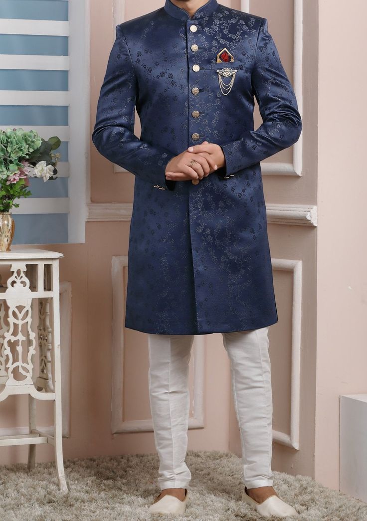 Ready-Made Sherwani With Trouser. Jacquard Brocade Fabric Top. Art Dupion Aligarhi Ready Made Trouser. Crafted in Chinese Collar Neck, and Full Sleeve. Satin Lining with Plain Work. High-Quality Matching Buttons. Please Note: The footwear shown in the picture is for presentation and photography purpose only. Color: There might be slight color variation due to lightings and flashes while photo shooting. The color may also vary because of different screen resolutions. Wash Care: Dry Clean Only. Western Party Wear, Indo Western Sherwani, Western Party, Western Parties, Chinese Collar, Readymade Saree, Dupion Silk, Collar Neck, Silk Trousers