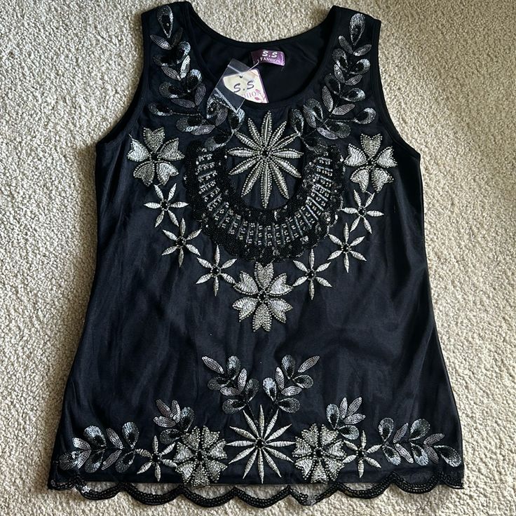 Unworn Black Fancy Bohemian Embroidered Top With Silver Embellishments Bought From Dubai. Open For Negotiations! Black Bohemian Top For Festive Occasions, Bohemian Black Tops For Festive Occasions, Bohemian Black Top For Festive Occasions, Black Bohemian Tops With Sequins, Black Bohemian Top With Sequins, Black Bohemian Sequin Tops, Black Tops With Mirror Work, Bohemian Embroidered Party Tops, Embellished Silver Summer Top