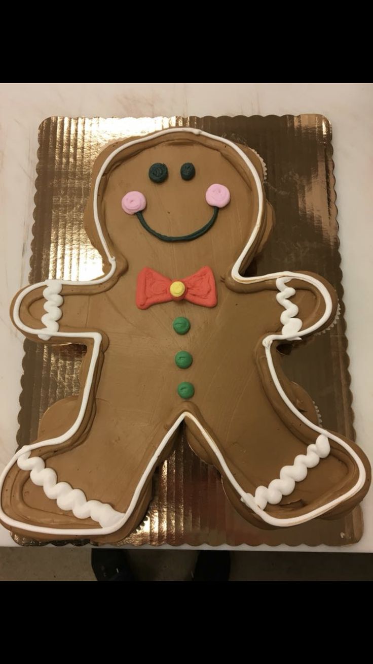 a decorated ginger is sitting on a tray