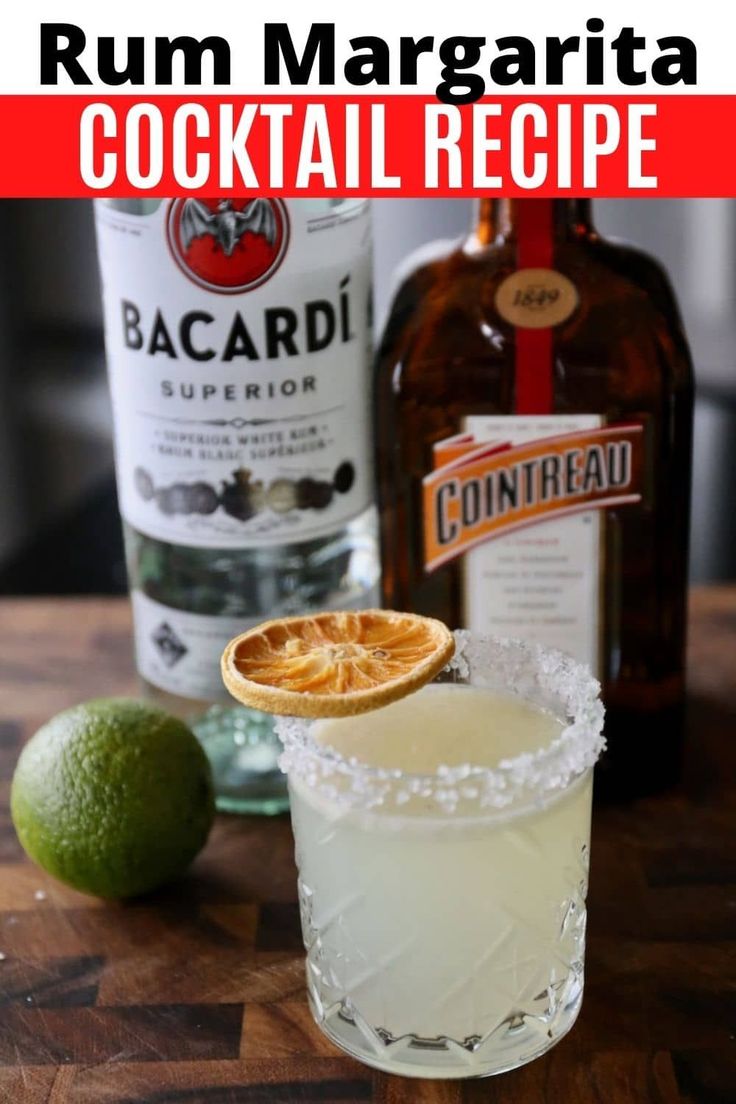 the rum margarita cocktail is served with an orange slice