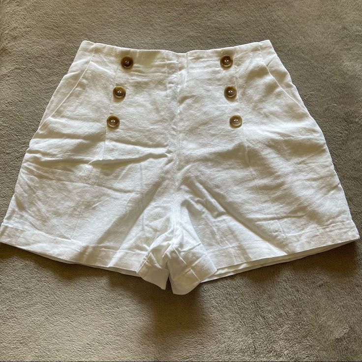 White Linen Tan Brown Button Front Shorts With Elastic Waist In Back And Pockets New With Tags 25” Waist 12.5” Rise 3” Inseam Open To Offers! Cotton Beach Shorts With Buttons, Beach Cotton Shorts With Buttons, Summer Vacation Shorts With Button Closure, Summer Beach Shorts With Buttons, Cotton Bottoms With Buttons For Vacation, Summer Bottoms With Buttons For Vacation, Summer Style Bottoms With Buttons For Vacation, Beach Shorts With Buttons, Summer Vacation Bottoms With Buttons