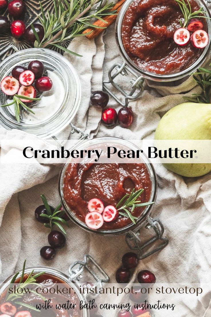 cranberry pear butter in small glass jars with rosemary sprigs and apples