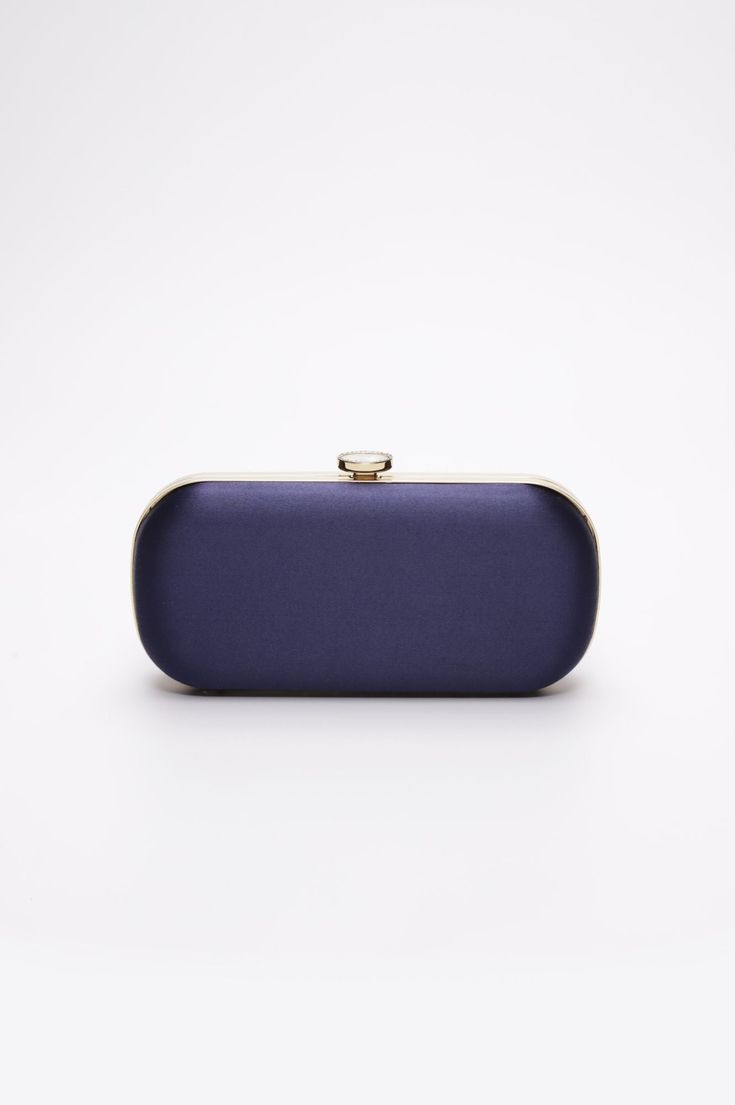 The Navy Bella Clutch is a custom designer clutch, and a timeless choice for an elegant wedding handbag. We’ve found your something blue… Your bridal purse. The Navy Bella Clutch is the perfect option for an evening wedding, as the duchess satin feels luxurious and sensible, without sacrificing style. Perhaps you’re celebrating on the New England coast at a chic hotel or private estate, complete your look with a stylish and elevated custom purse that you’ll love for years to come. The Bella Clut Navy Blue Clutch, England Coast, Navy Clutch, Navy Purse, Italian Handbags, Beautiful Wardrobe, Evening Clutches, Wedding Handbag, Bridal Purse