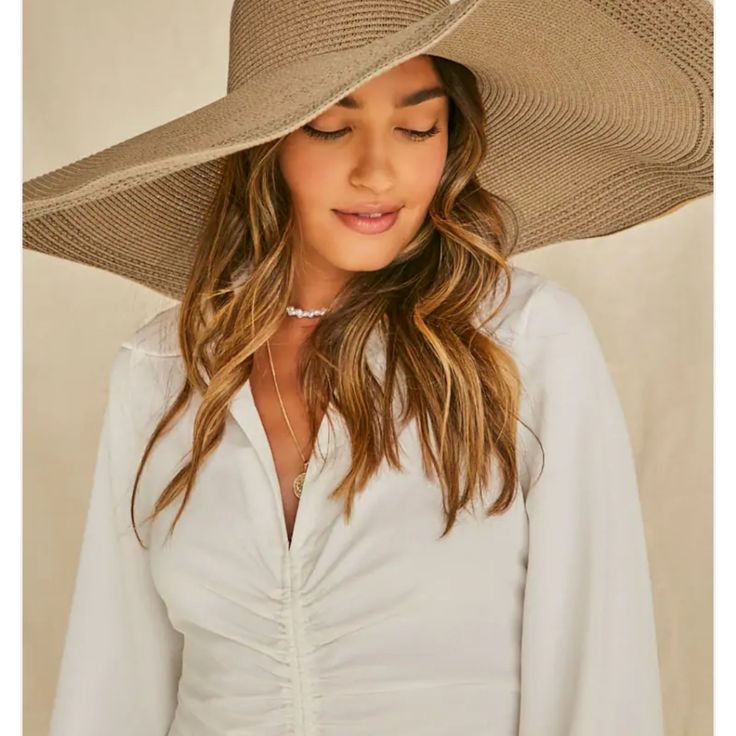 Very Large Straw Hat Perfect For Vacation And Shading Yourself From The Sun Chic Beige Sun Hat For Day Out, Chic Beige Hat For Day Out, Chic Beige Panama Hat For Day Out, Chic Neutral Hats For Spring, Neutral Wide Brim Hat For Vacation, Neutral Wide Brim Hat For Spring, Neutral Beach Hat For Spring, Spring Neutral Wide Brim Hat, Spring Beach Hat In Neutral Color