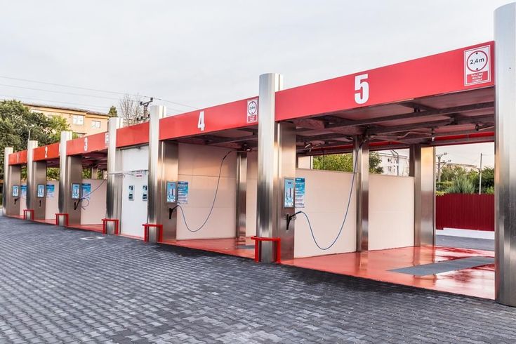 an electric charging station with red and white panels