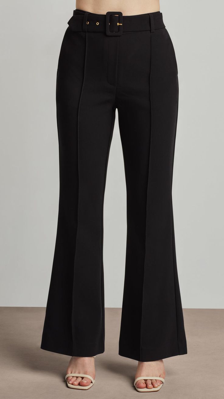 Bring a retro flare to any occasion with these belted flared pants. Featuring a belt with a covered buckle and sleek front pintucks to elongate the legs, these pants are the perfect companion to take you from desk to dinner. Front Slant Pockets Back Single Welt Pocket Belt with Fabric Covered Buckle, Metal Bar & Eyelets Front Pintucks Single Welt Pocket, Belted Pants, Black Camel, Ellen Tracy, Pocket Belt, Flared Pants, Metal Bar, Pin Tucks, Fabric Covered