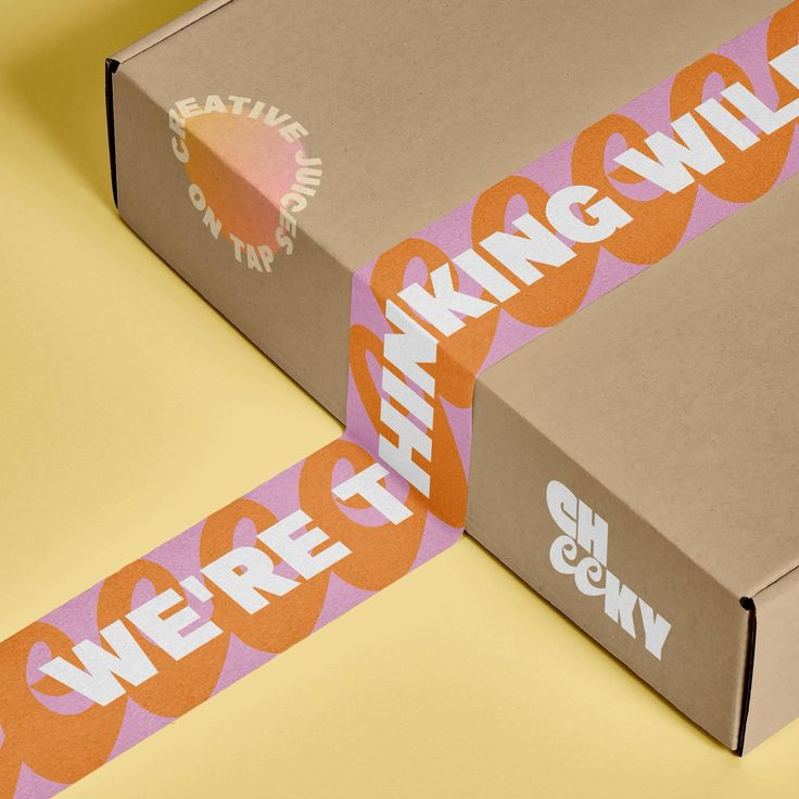 an open box with the words we're hiring printed on it