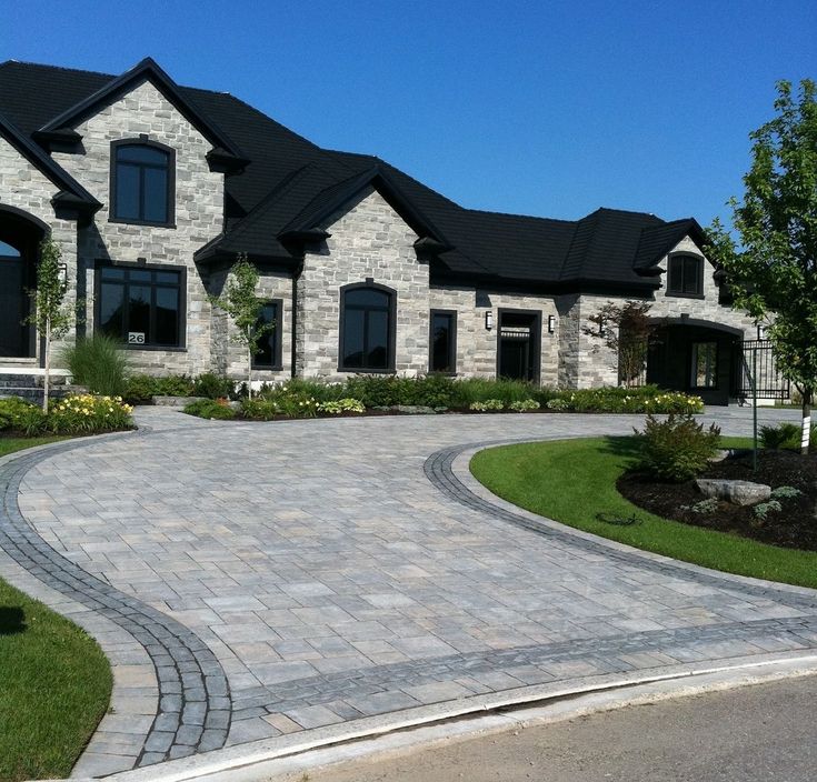 a large house that has a driveway in front of it