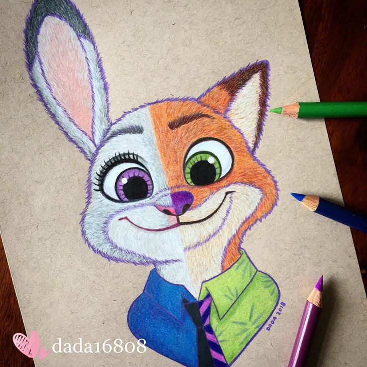 a drawing of a cartoon rabbit wearing a suit and tie with colored pencils next to it