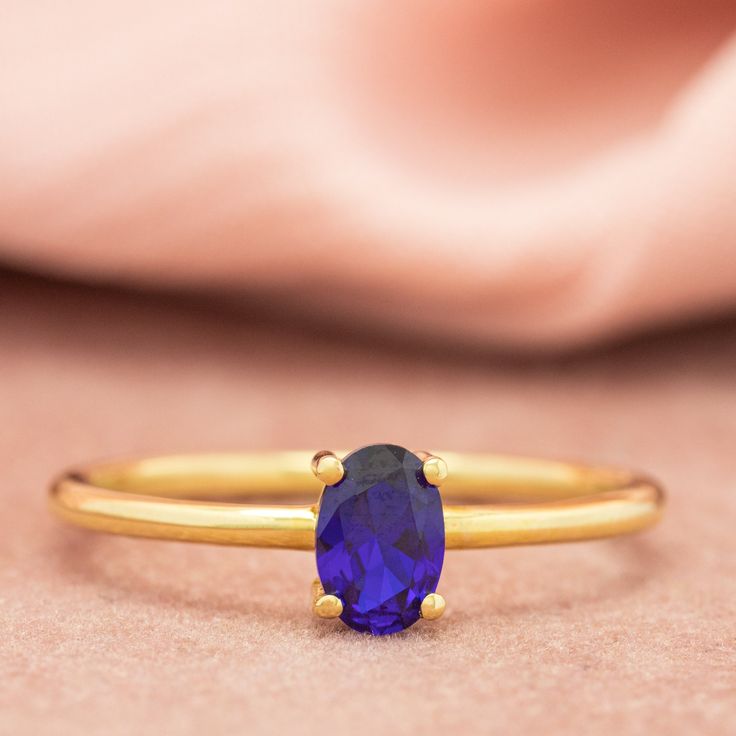 Embrace timeless elegance with the 14K Solid Gold Sapphire Ring. A dainty oval sapphire shimmers at its center, whispering promises of summer skies. Crafted in luxurious 14k gold (choose your color this ring seamlessly complements your unique style, stacked or solo. Simple sophistication, built to last. ♦ SPECIFICATIONS ♦ ▸ Made to Order ▸ Custom Gold Color: Yellow Gold, Rose Gold, White Gold ▸ Material: 8K-14K-18K Solid Real Gold (not gold-filled or no gold plated) ▸ Sapphire: 0.56 ct ▸ Free Ex Beautiful Gold Rings, Oval Sapphire Ring, Ring Minimal, Sapphire Solitaire Ring, Gold Sapphire Ring, Minimal Ring, Tiny Rings, Ring Sapphire, Sapphire Solitaire