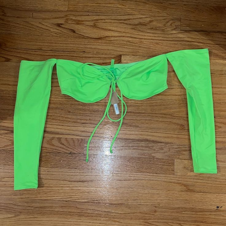 Questions? Leave A Comment Below! Green Long Sleeve Swimwear For Beach, Green Long Sleeve Beachwear Swimwear, Long Sleeve Tops For Pool And Spring, Green Long Sleeve Swimwear For Poolside, Fitted Tops For Poolside And Beach Season, Solid Swimwear For Club In Spring, Stretch Swimwear With Drawstring For Party, Stretch Drawstring Swimwear For Party, Fitted Beachwear Tops For Poolside