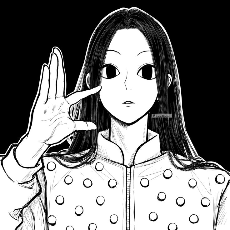 a girl with long hair is holding her hand up in front of her face and making the peace sign