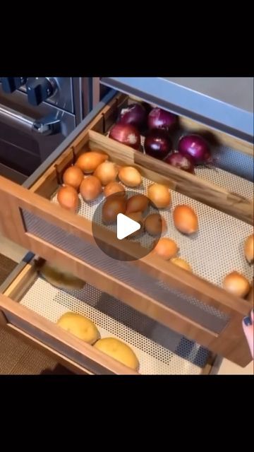 an open drawer filled with different types of fruit and vegetables on top of each other