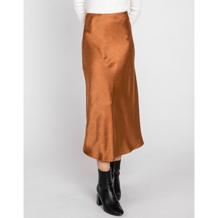 The Classic style slip skirt that you know and love is now available in this Metallic Rust color. This style is cut on a bias which means that the fabric has some stretch and it's very comfortable on. It's a true midi-style with a stretchy elastic waistband. The sides of the skirt go up ever so slightly. 95% polyester 5% spandex Approximate Size Chart Small: Waist 26-31, Hip 38, Length 34 Medium: Waist 28-32, Hip 40, Length 34 Large: Waist 31-36, Hip 42, Length 35 Style Slip Skirt, Satin Slip Skirt, Sherman Oaks, Slip Skirt, Satin Slip, Go Up, Rust Color, Small Waist, Classic Style