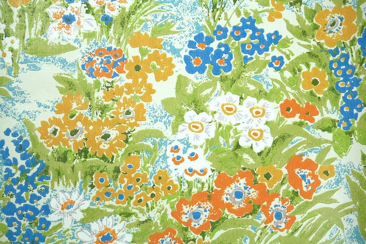 an orange, blue and green floral print fabric