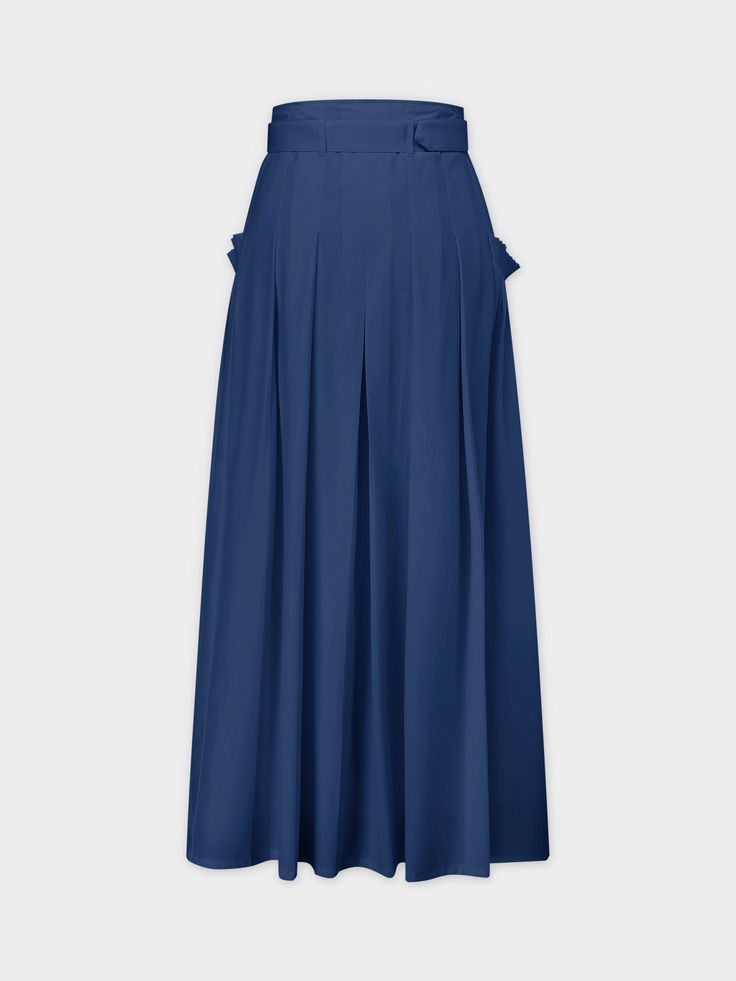 This Pintuck Pocket Skirt-Navy is a versatile piece that adds style and functionality to your wardrobe. The elegant pintuck design and convenient pockets make it a must-have! Chic Blue Accordion Pleated Skirt, Formal Fitted Pleated Skirt With Pockets, Chic Blue Skirt With Accordion Pleats, Chic Blue Pleated Skirt For Formal Occasions, Formal Flared Skirt With Pockets, Formal Midi Skirt With Pockets, High Waist Solid Pleated Skirt For Work, Fitted Blue Bottoms With Accordion Pleats, Solid Color Pleated Skirt With Pockets