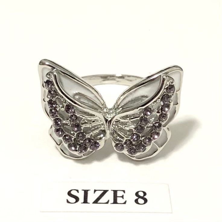 Butterfly Ring With Rhinestones, Size 8 Silver Plated, With Rhinestones Brand New Condition, Please See Pictures For Condition And Details, Thanks. The Quarter Is Shown For Scale And Is Not Included. Unisex Ring, Can Be Worn By Men And Women, Same Sizing On Ring Sizes. I Size All My Rings With A Mandrel So Sizes Are Accurate To Us Ring Sizes. Elegant Silver Butterfly Ring With Diamond Accents, Silver Butterfly Ring With Diamond Accents For Wedding, Sterling Silver Rings With Rhinestones, Silver Rings With Rhinestones As Gift, Silver Ring With Rhinestones As Gift, Silver Crystal Rings With Stone Setting, Silver Jeweled Promise Ring, Silver Sterling Butterfly Ring With Diamond Accents, Silver Butterfly Ring For Parties