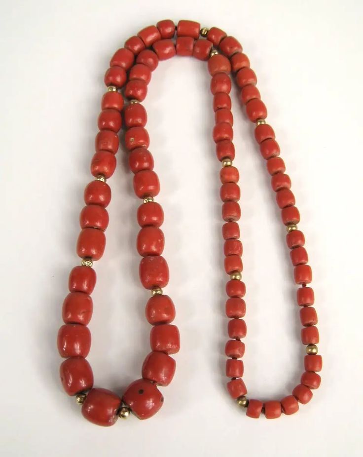 For Sale on 1stDibs - Barrel shaped Natural Mediterranean Red Coral beads that graduate in size. Gold Beads scattered between the coral beads. GIA Identification report No. Red Coral Polished Beads For Jewelry Making, Polished Coral Beaded Necklaces, Coral Red Beaded Necklaces With Polished Beads, Red Coral Spacer Beads, Round Shape, Red Coral Round Spacer Beads, Red Coral Spacer Beads, Traditional Red Rondelle Necklaces, Coral Beaded Necklaces With Polished Red Coral Beads, Red Rondelle Beaded Jewelry