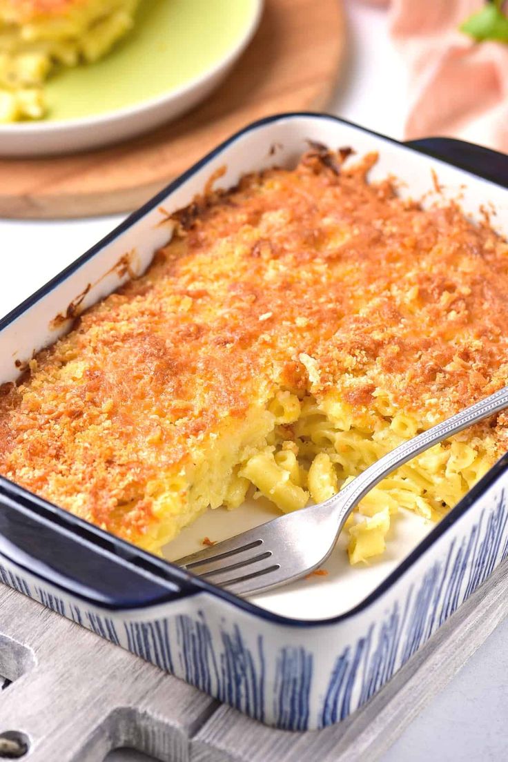 a casserole dish filled with macaroni and cheese