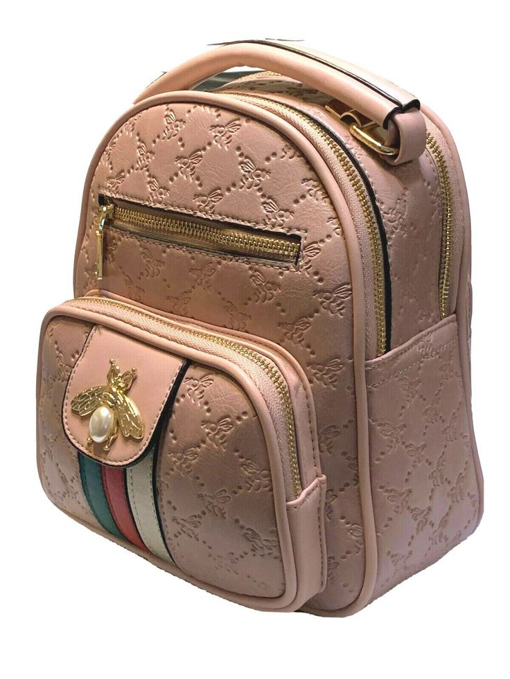 Ladies super cute American Bee PU Leather Monogrammed Bee Embellished Backpack  New with tags. Features: Monogram Queen Bee Striped Backpack VERTICAL STRIP ACCENT. MATERIAL: 100% PU Leather 2  Compartment with Zipper Top Closure  1 Front Packet  1 Front Zipper Packet Gold Tone Hardware Handel Tap Adjustable NYLON Strap COMES IN 3 BEAUTIFUL FASHIONABLE COLORS. TRIP ACCENT Monogram Fashion Backpack Measurement : 10"x 9"x4" Package Include: One Backpack  Shipping: Shipped with USPS Priority Mail in Pink Rectangular Backpack With Adjustable Strap, Pink Leather School Backpack With Zipper, Pink Leather Backpack For School With Zipper, Pink Leather Backpack With Zipper For School, Pink Rectangular Leather Backpack For Everyday Use, Pink Leather Backpack For Daily Use, Casual Pink Leather Backpack, Pink Satchel Leather Backpack For School, Pink Leather Satchel Backpack For School