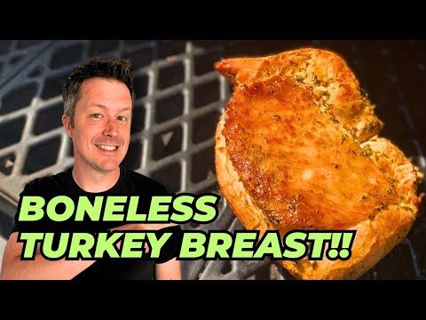 a man holding up a large piece of meat in front of him with the words boneless turkey breast