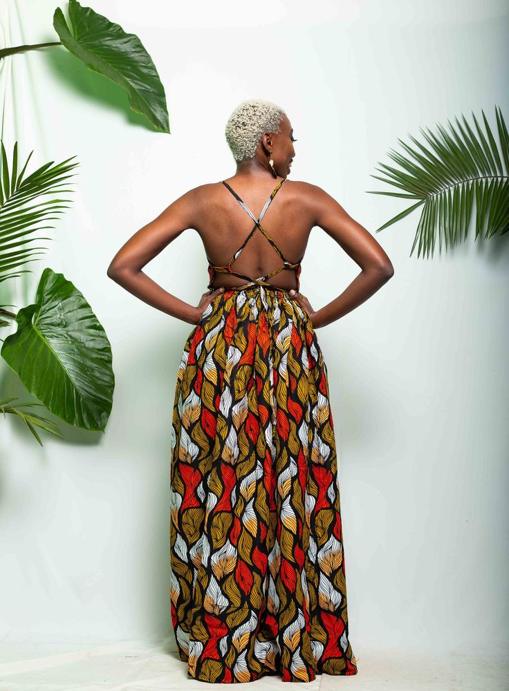 Our IBADAN Maxi dress is made from 100% cotton African print material. The dress is the perfect wedding guest summer attire. *Perfect for summer/spring/autumn. *Length: 64inches/162.56 cm (Can be adjusted) *Has pockets. *The material is 100% cotton. *The top part is lined. However, the bottom is not lined. *The waist is elasticized. *Kindly provide your bust and waist measurements to ensure we get the perfect fitting. *Made in Kenya with 🧡 SIZE GUIDE XXS/ UK 4 / US 0 = B -30 W -24 H -34 XS / UK Patterned Cotton Maxi Dress For Vacation, Summer Maxi Dress With Bold Print, Beach Cotton Midi Dress With Pattern, Multicolor Cotton Maxi Dress For Vacation, Patterned Cotton Maxi Dress For Summer, Multicolor Print Cotton Dress For Vacation, Patterned Cotton Summer Maxi Dress, Cotton Dress With Vibrant Print For Vacation, Summer Cotton Maxi Dress With Vibrant Print