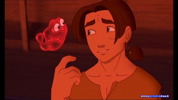 an animated image of a man holding a red object in his hand and pointing at it