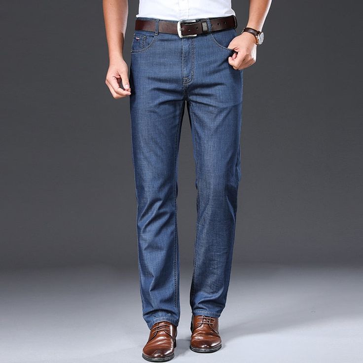 Elegant Straight Leg Jeans With Pockets, Formal Straight Leg Denim Jeans, Elegant Straight Denim Bottoms, Business Casual Slim Fit Jeans With Pockets, Spring Straight Dark Wash Pants, Straight Dark Wash Pants For Spring, Medium Wash Straight Pants For Work, Straight Medium Wash Pants For Work, Casual Tailored Jeans For Spring