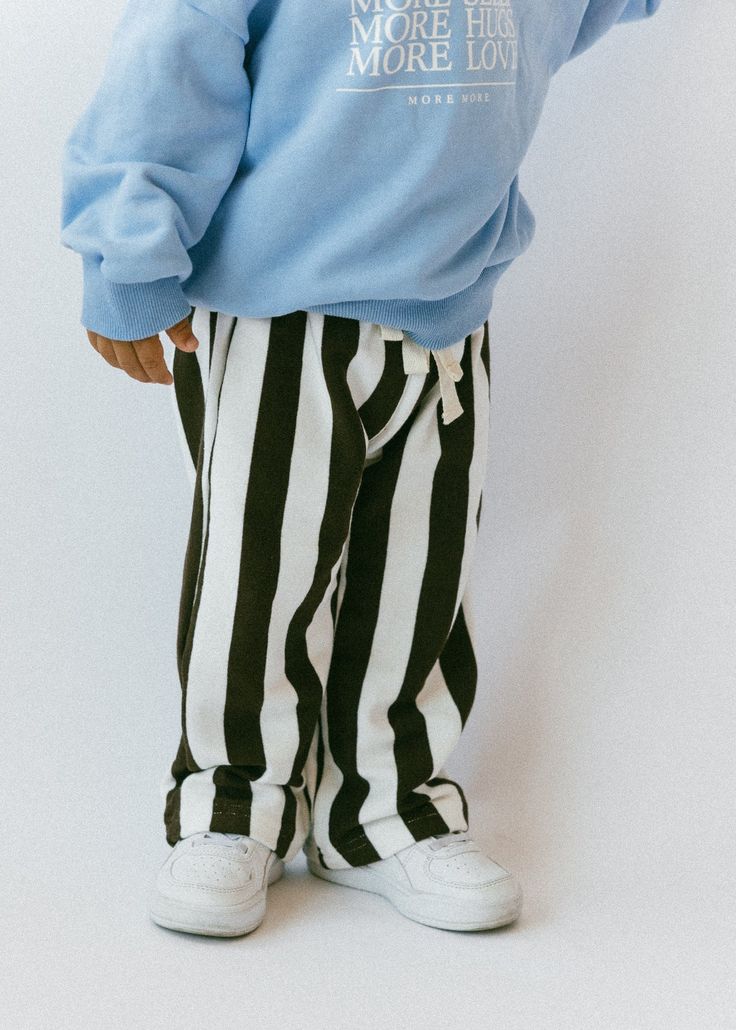 Wide Stripe Pants Casual Cotton Sweatpants With Contrast Stripes, Striped Straight Leg Bottoms With Elastic Waistband, Trendy Striped Straight Pants, Trendy Trousers With Vertical Stripes, Casual Striped Streetwear Pants, White Bottoms With Drawstring And Long Pants, Sporty Striped Bottoms For Streetwear, White Drawstring Long Pants, Trendy High-waisted Bottoms With Vertical Stripes