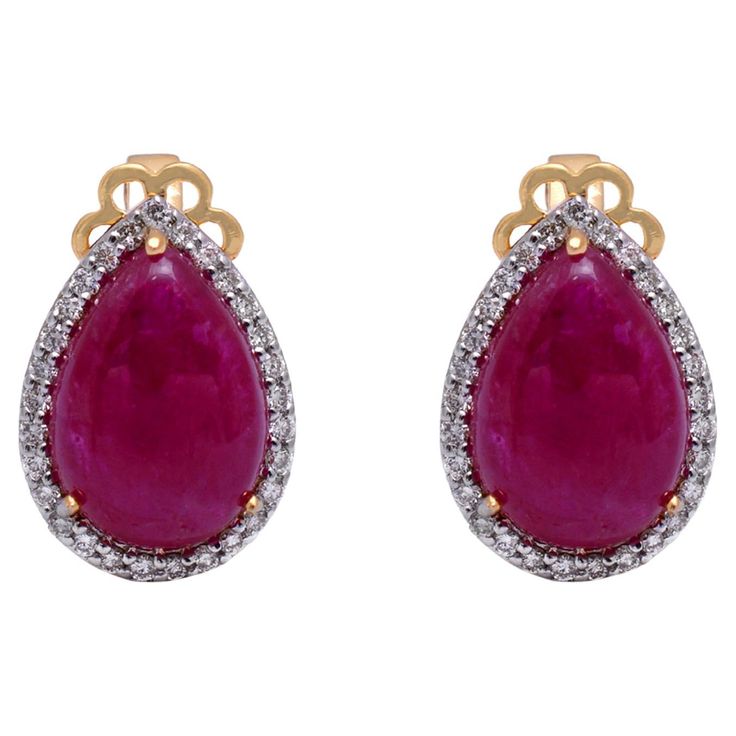 18K Yellow Gold Diamond Earrings Gross Weight : 4.140 Gold Weight: 2.616 Cts. Diamond Weight: 0.39 Cts. Ruby Weight: 7.23 Cts. Measurement: 15X10 mm Luxury Pear-shaped Gemstone Diamond Earrings, Luxury Pear-shaped Diamond Earrings With Gemstones, Formal Ruby Gemstone Diamond Earrings, Ruby Gemstone Diamond Earrings For Formal Occasions, Formal Pear-shaped Pave Setting Earrings, Formal Pear-shaped Earrings With Pave Setting, Formal Pear-shaped Pave Earrings, Formal Ruby Earrings In Yellow Gold, Yellow Gold Ruby Earrings With Diamond Accents