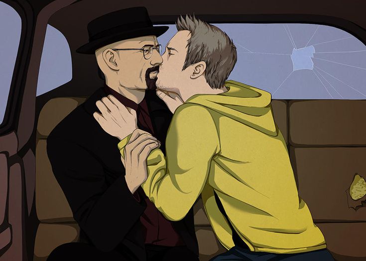 two men are sitting in the back seat of a car, one is kissing the other