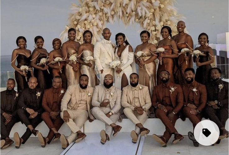 a group of men and women posing for a photo