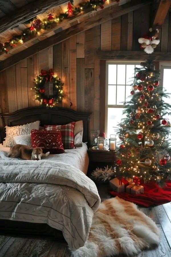 a bedroom decorated for christmas with a tree in the corner