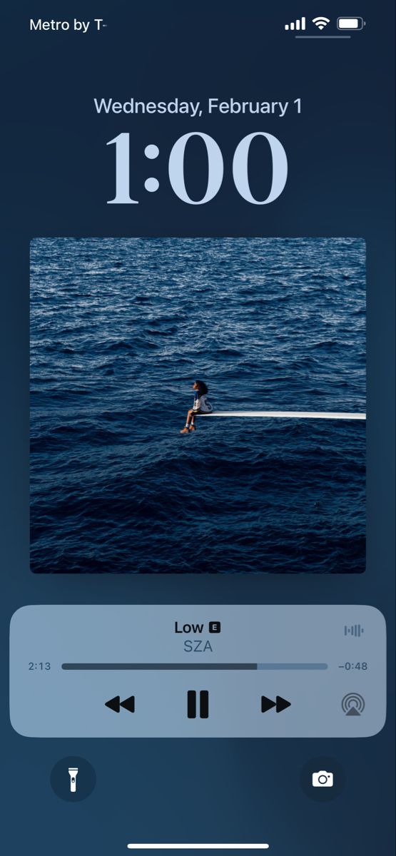 an iphone screen showing the time and location of someone swimming in the ocean with their surfboard