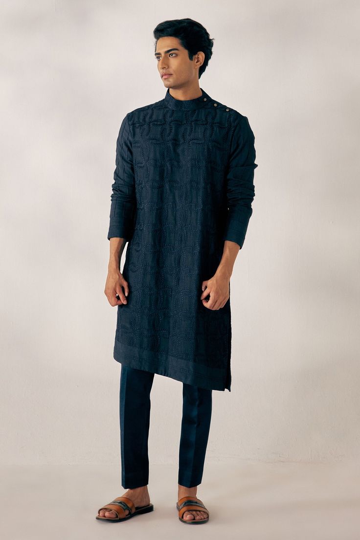 Midnight blue textured embroidered kurta. Paired with tone on tone tapered trousers. Component: 2 Pattern: Embroidered Neckline: High neck Sleeve Type: Long Fabric: Slub Silk Color: Blue Other Details:  Asymmetric button placket Occasion: Sangeet, Wedding - Aza Fashions Jatin Malik, Trouser Pattern, Blue Kurta, Kurta Set For Men, Luxury Footwear, Blue Texture, Nehru Jackets, Tapered Trousers, Tone On Tone