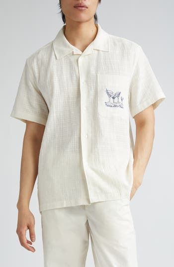 Destined to be a straight-up favorite, this boxy camp shirt cut from breathable cotton is served with a twist thanks to dirty-martini embroidery on the pocket. 31" length; 48" chest (size 50 EU) Front button closure Notched collar Elbow-length sleeves Chest patch pocket 100% cotton Dry clean or machine wash, dry flat Made in Portugal Designer Clothing Martini Embroidery, Embroidery Shirt Men, Designer Clothing Brands, Dirty Martini, Cotton Long Sleeve Shirt, Shirt Embroidery, Camp Shirt, Notched Collar, Camping Shirt