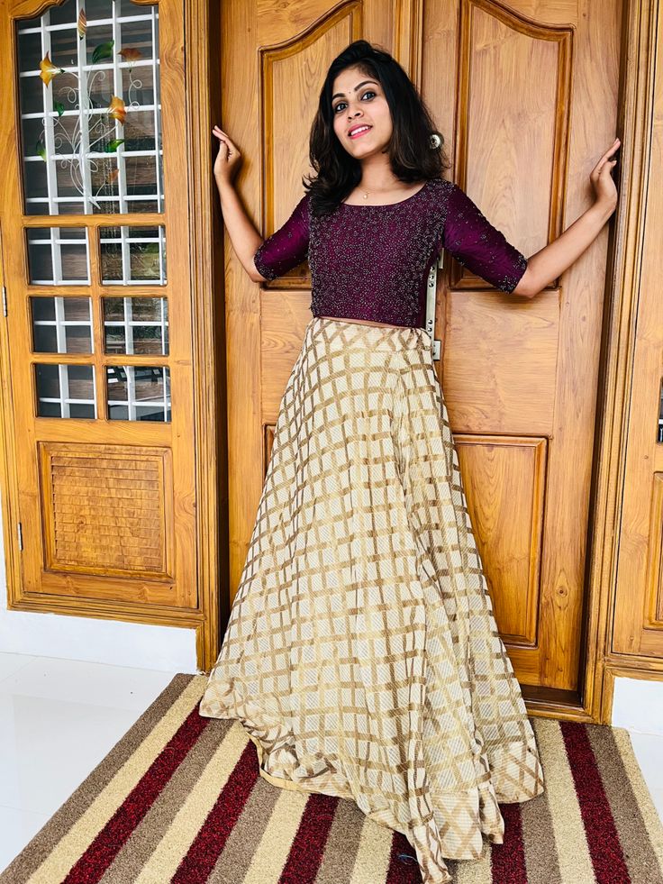 Skirt and crop top Kerala Style Skirt And Top For Kids, Long Skirt And Top For Onam, Midi And Top Kerala, Tops For Skirts Indian Casual, Golden Skirt And Top, Golden Skirt Outfit Indian, Skirt And Crop Top Indian Weddings, Crop Top Designs For Long Skirt, Onam Outfits Ideas Skirt And Top