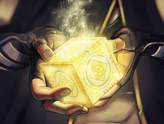 a person holding a golden object in their hands with some sparkle coming out of it