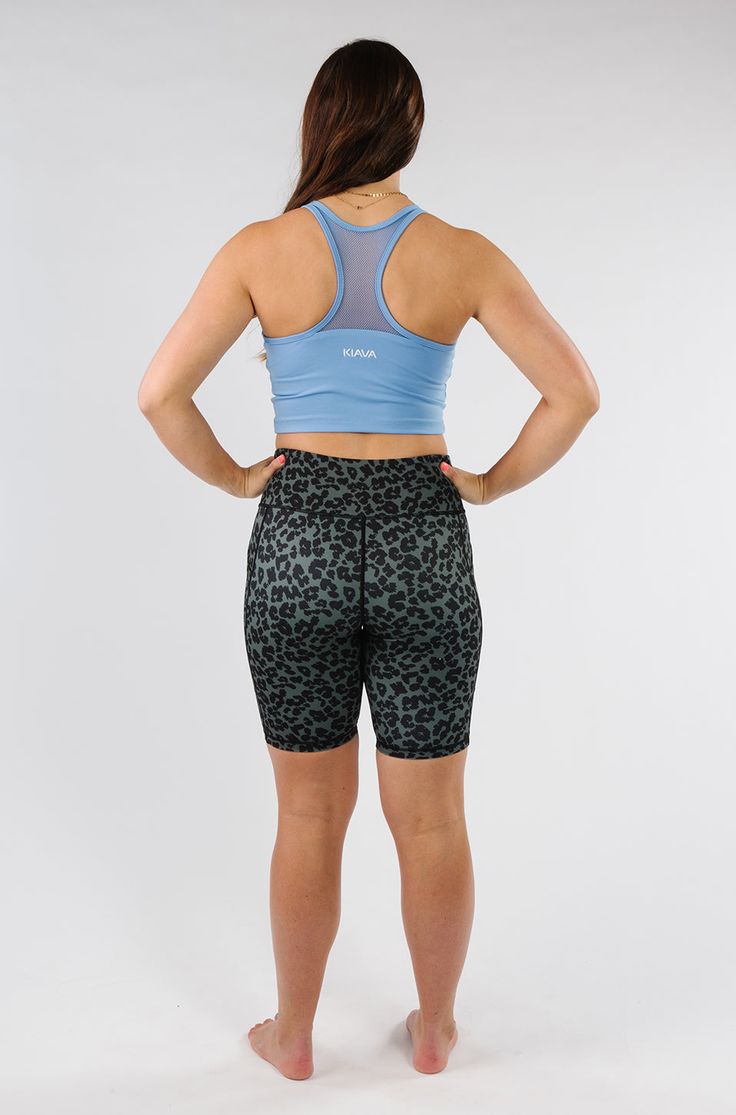 For those of you who want shorts but more length, the 8" shorts are finally here! With the same fabric and design as our best-selling capris and leggings, you're going to love these fun prints that help you feel more confident by hiding cellulite. Have a full range of motion when working out because of the four-way stretch and high-waisted support. The leg grips are sure to keep these shorts in place through endless burpees and your longest runs. Trendy Activewear With Built-in Shorts, Trendy Athletic Shorts For Workout, Trendy Compression Workout Shorts, Trendy Workout Athletic Shorts, Trendy Workout Athletic Shorts With Short Legs, Trendy Knee-length Shorts For Sports, Trendy Knee-length Workout Shorts, Trendy Moisture-wicking Short Length Activewear, Feel More Confident