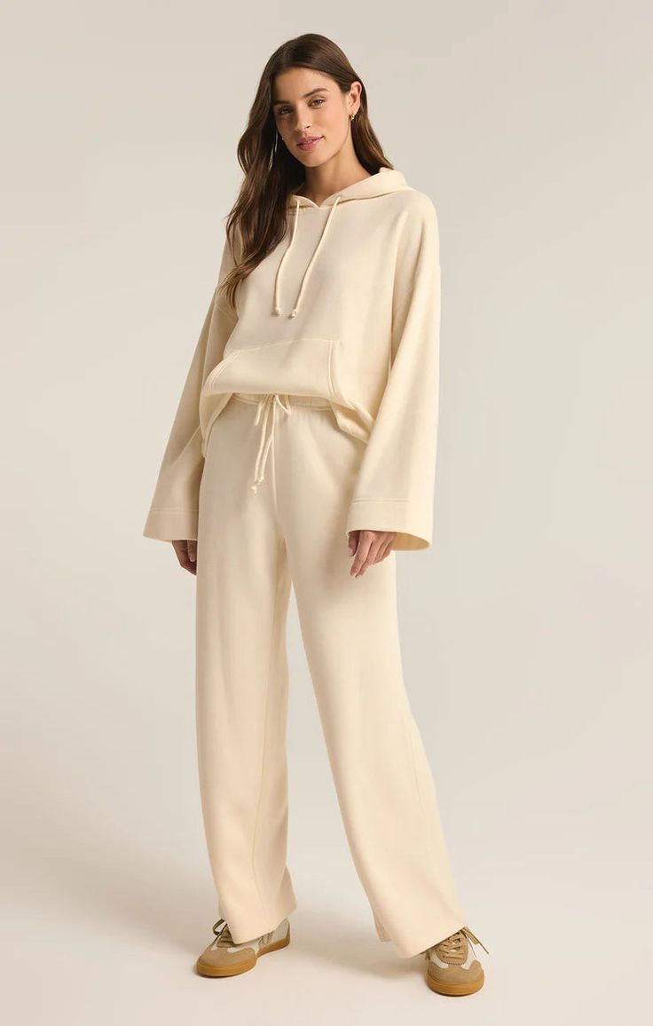 Take fashion and comfort to the next level with the Feeling the Moment Set - a lounge in style cream two-piece hoodie set. Embrace the moment and relax with this playful and versatile outfit. Upgrade your loungewear game! Taylor Swift Dress, Women Lifting, Maxi Jumpsuit, Athleisure Tops, Silk Bottoms, Lift Off, Hoodie Set, Leather Denim, Versatile Outfits