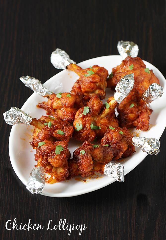 chicken tikkas on a white plate with foil wrapped around them