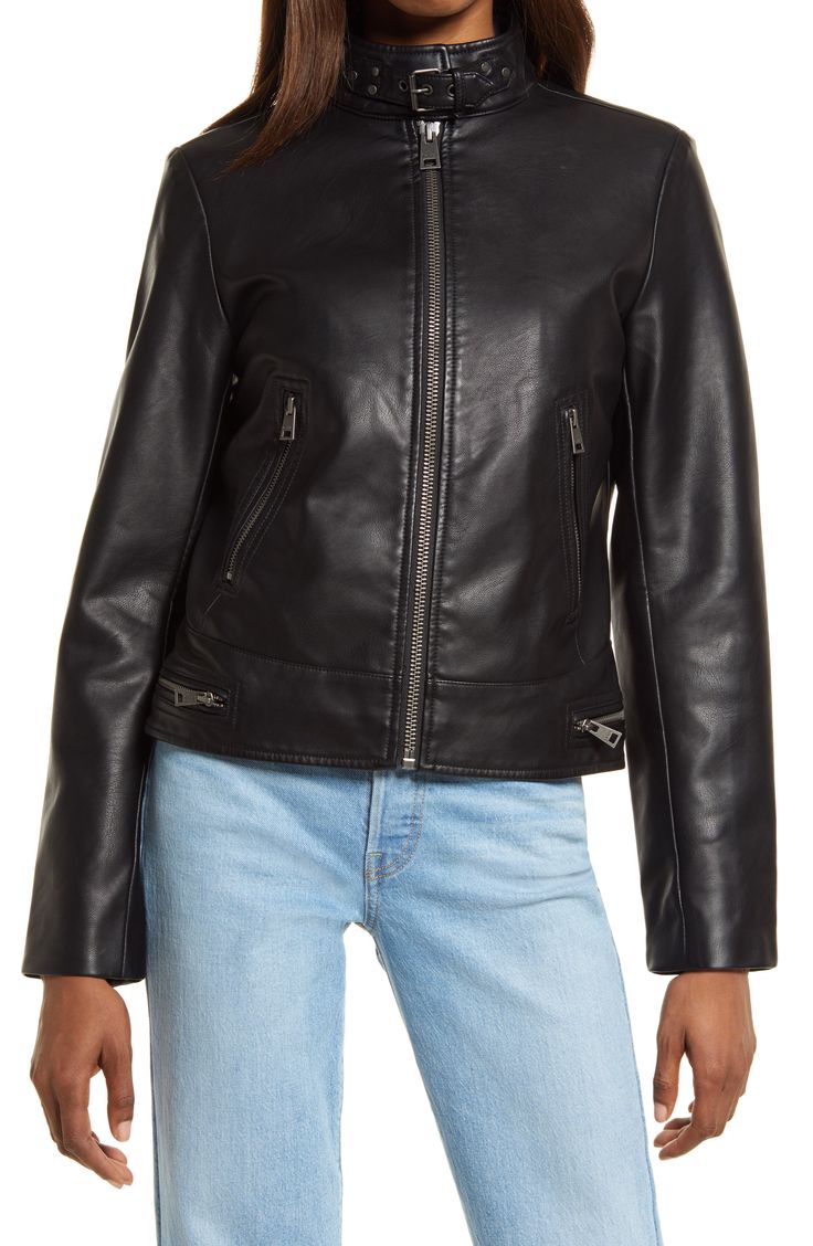 With all the attitude of the real deal, this faux-leather racer jacket revs up with authentic motocross details like exposed zippers and a buckled throat latch. 22 1/2" length Front zip closure Stand collar with buckle throat latch Front zip pockets Lined 100% polyurethane Machine wash, tumble dry Imported Women's Clothing Biker Style Faux Leather Jacket With Zip Fly, Levi's Biker Jacket For Fall, Levi's Leather Jacket With Zipper For Fall, Levi's Biker Jacket With Zipper For Spring, Levi's Biker Leather Jacket For Spring, Faux Leather Biker Jacket With Zip Fly, Casual Levi's Leather Jacket With Zipper, Fitted Levi's Biker Jacket With Zipper, Trendy Levi's Leather Jacket With Zipper Closure