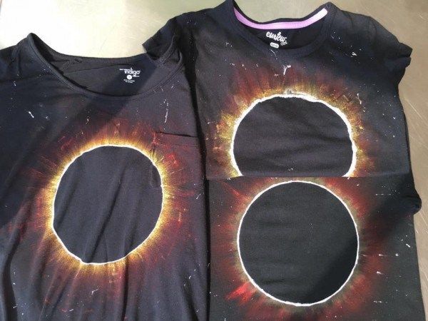 two t - shirts with holes in the middle