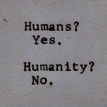 graffiti on the side of a building that says humans? yes, humanity? no