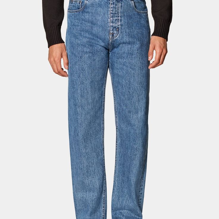 These classic mid-blue jeans are cut straight through the hip, thigh and leg with a classic 5-pocket design, button fly, and belt loops. Blue Jeans With Belt Loops And Straight Shape, Blue Straight Jeans With Belt Loops, Straight Denim Blue Jeans With Belt Loops, Classic Blue Jeans With Belt Loops, Classic Straight Blue Jeans, Classic Rigid Denim Jeans With Belt Loops, Classic Blue Jeans With Standard Cut, Classic Straight Denim Jeans, Classic Blue Rigid Denim Jeans