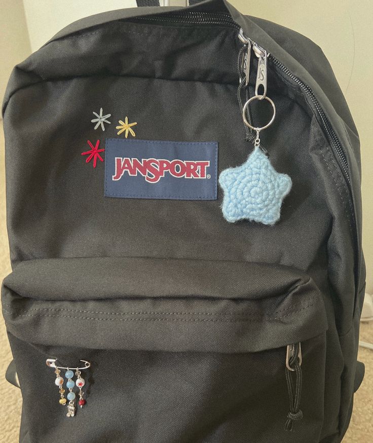 embroidered backpack with crochet star keychain and safety pin charm Backpack With Pins, Crochet Bag Charm, Mochila Jansport, Mochila Crochet, Stylish School Bags, My Backpack, Aesthetic Backpack, Diy Crochet Bag, Embroidered Backpack