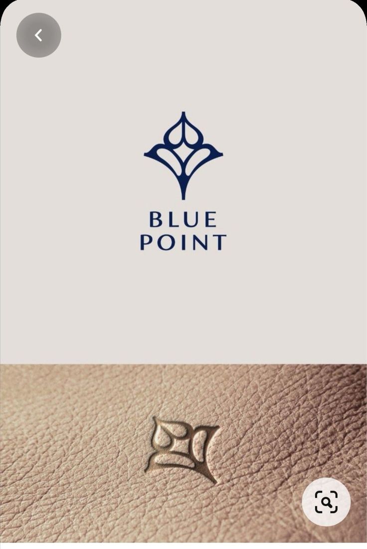 the logo for blue point is shown on top of a white and brown leather bag