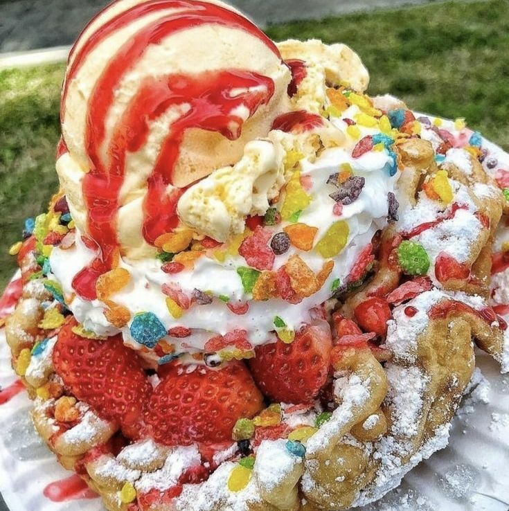 an ice cream sundae on a paper plate