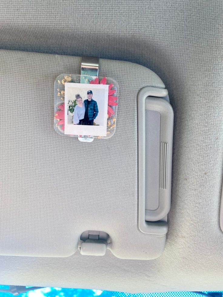 a car seat with a photo attached to it